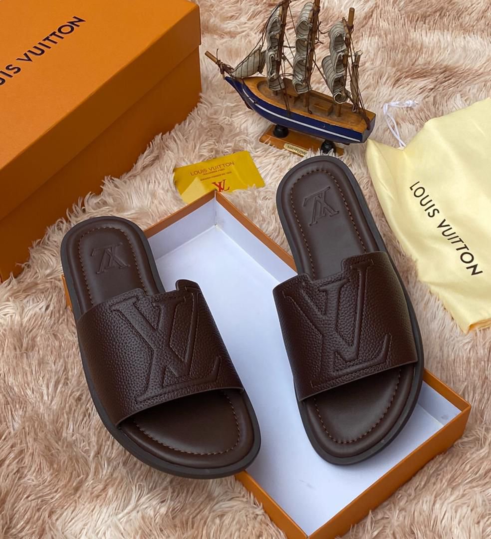 Louis Vuitton coffee brown slippers.